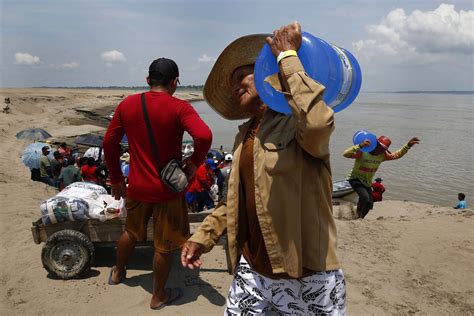 In the Amazon, communities next to the world’s most voluminous river are queuing for water